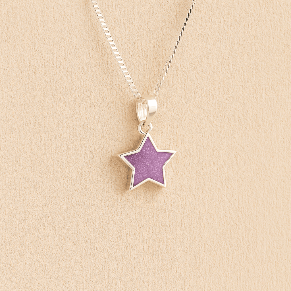 Silver star ashes pendant with lavender resin on a beige background