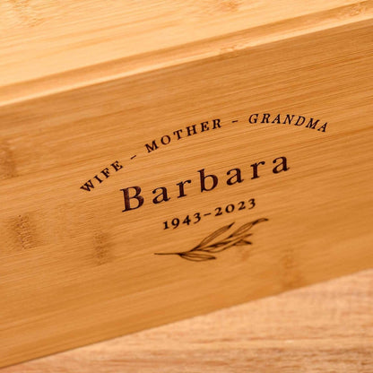 Close-up of bamboo wood cremation urn – eco-friendly engraved solid wood ashes keepsake