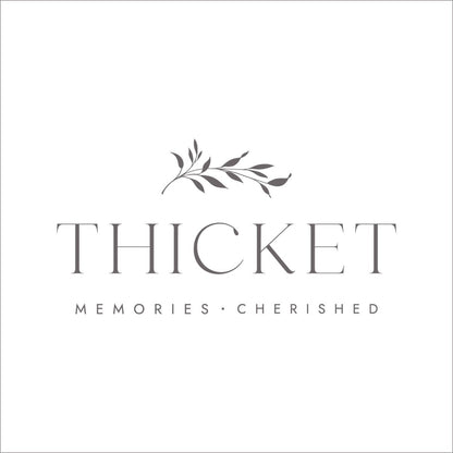 Thicket Memorials brand logo on white background – offering cremation urns for children, infants, stillborn babies, and miscarriage loss.