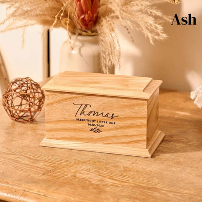 Infant cremation urn made from natural ash wood – suitable for stillborn or baby ashes.
