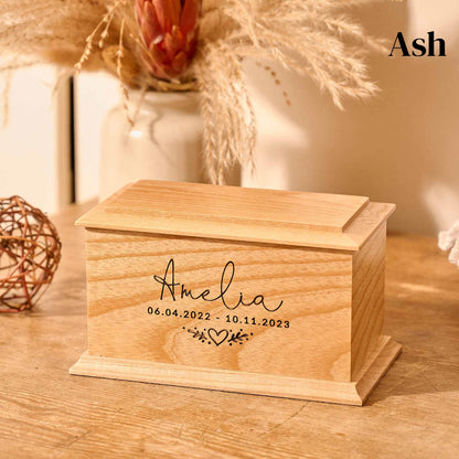 An urn for baby's ashes. Personalised urn with the name Amelia.