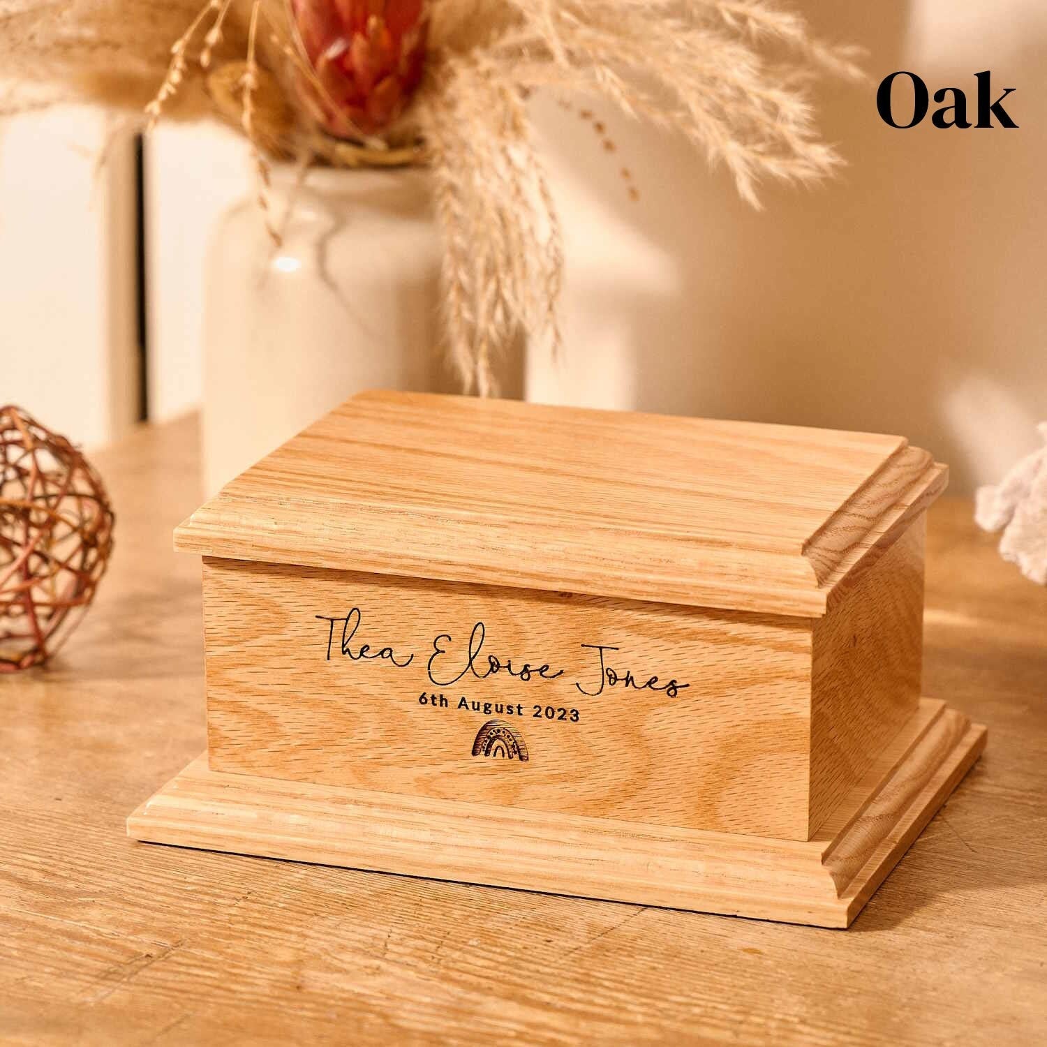 A bespoke, oak cremation urn for stillborn ashes or newborn ashes. 